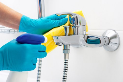 Carpet cleaning technician reviewing booking details and service requirements